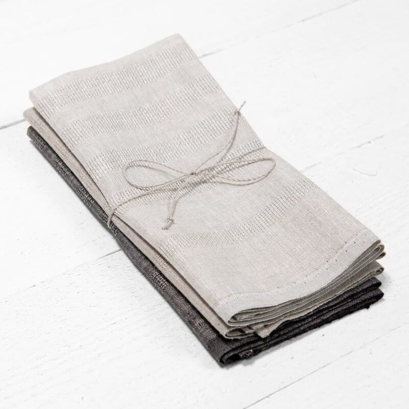 set of kitchen towels in beige, natural and black