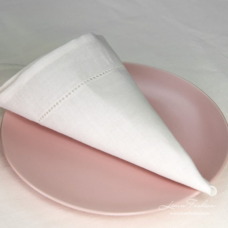 White napkin in hole pattern.