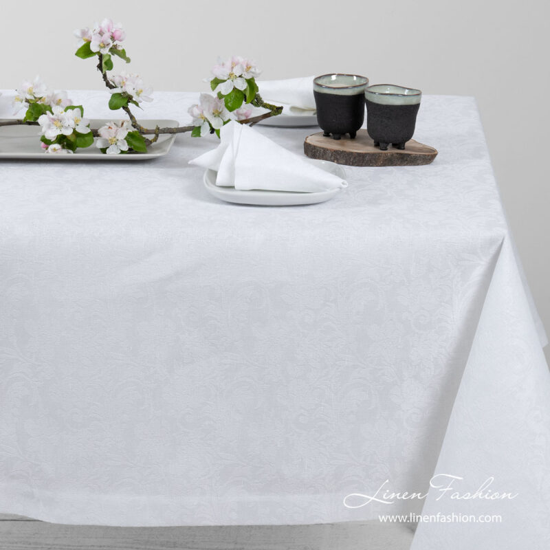 White linen tablecloth in flowers pattern