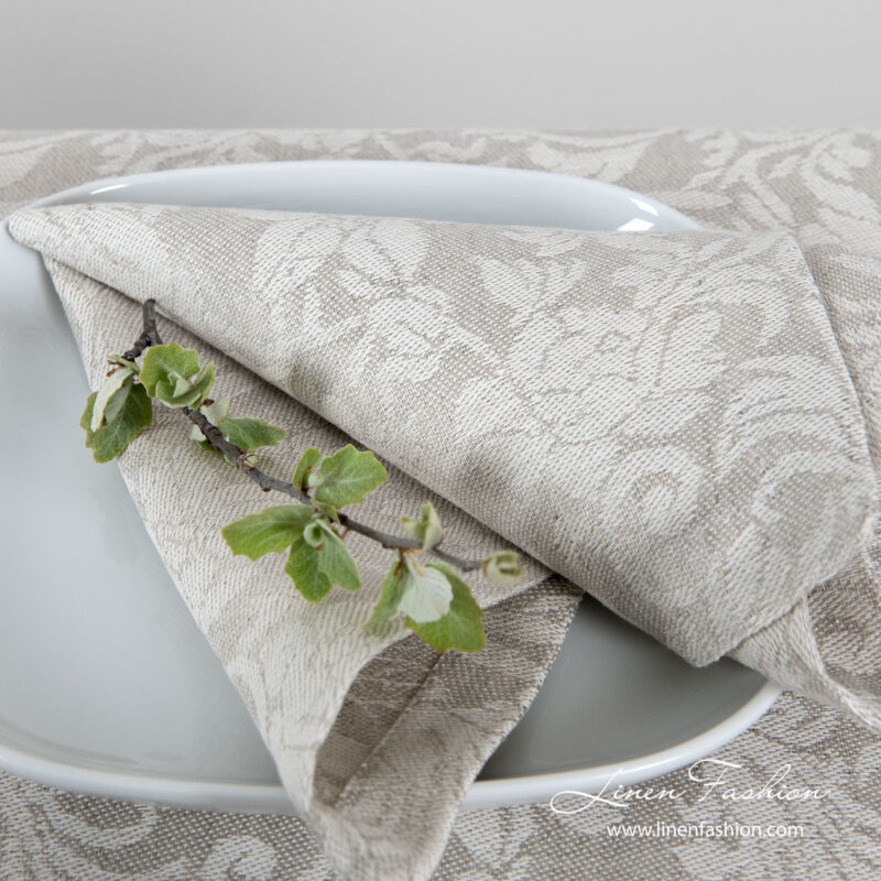 Jacquard linen napkin with grey flowers