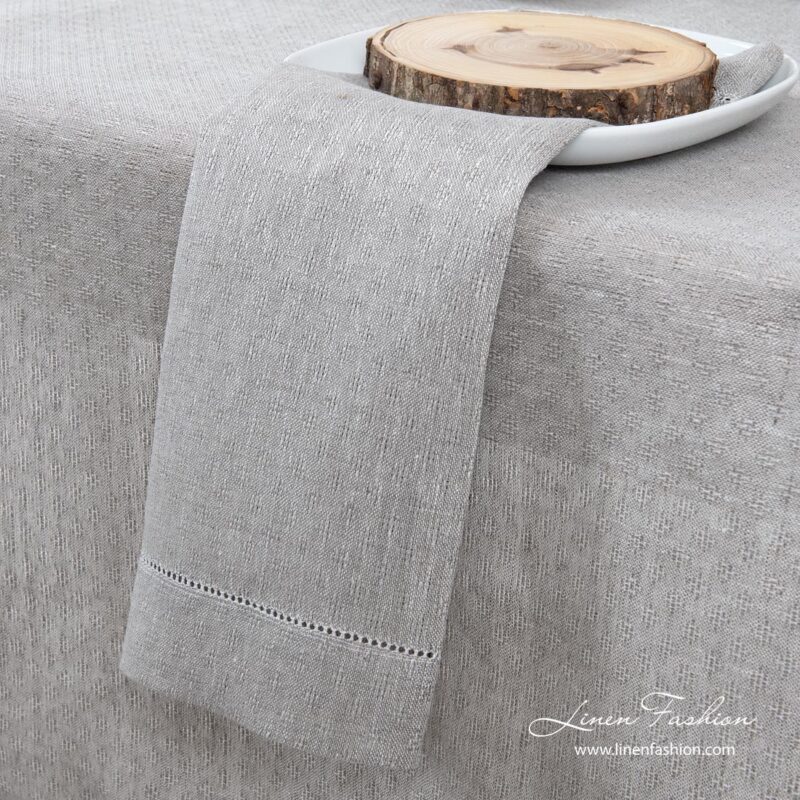 Light grey 100% linen napkin in a slight open-weave pattern
