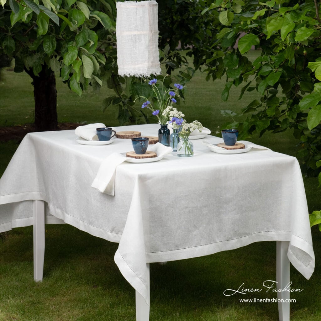 White patterned linen tablecloth with hemstitch