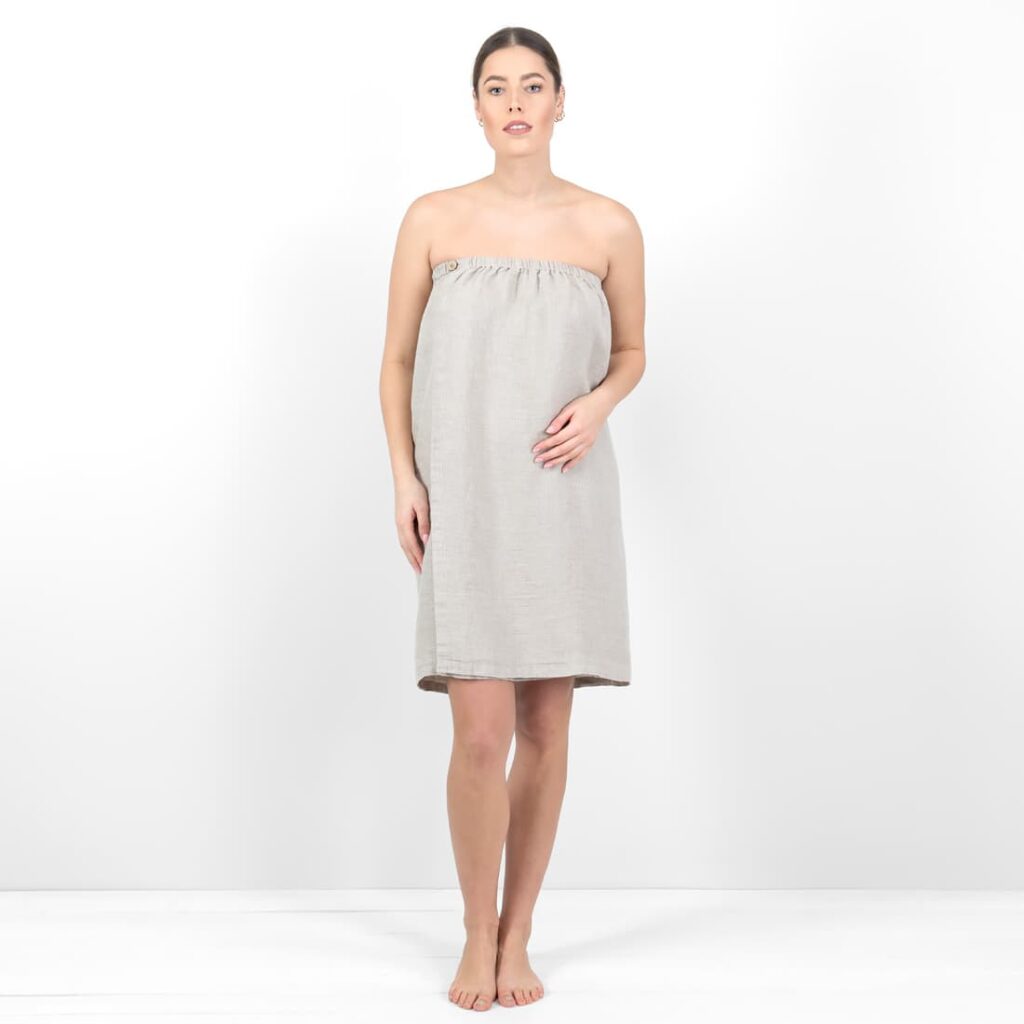Grey towel with a button
