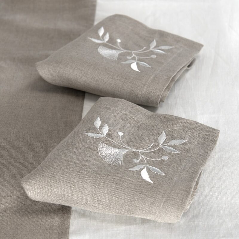 Natural linen napkin with white floral stitching, 100% linen