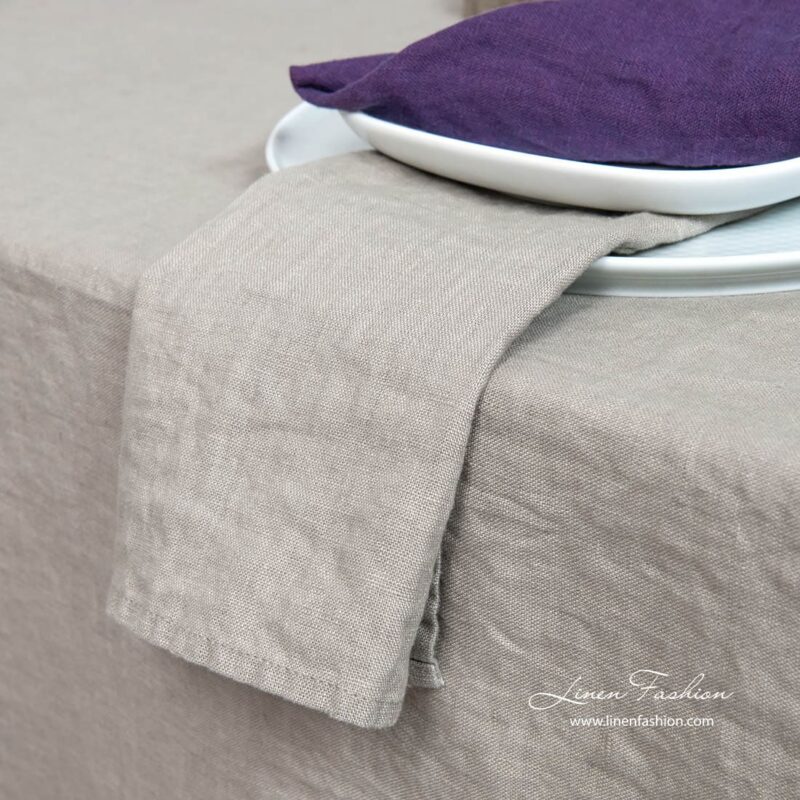Linen napkin in brownish grey color.