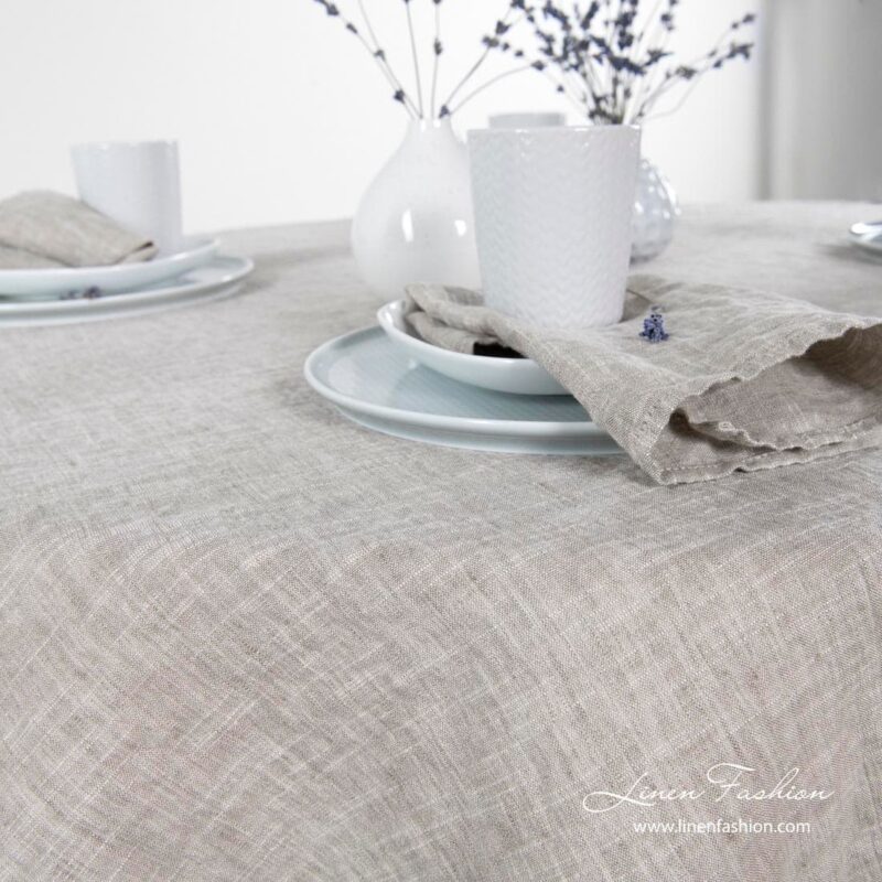 Linen-cotton round tablecloth in light grey.