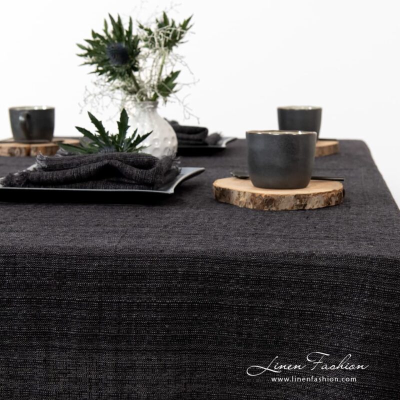 Charcoal colored tablecloth.