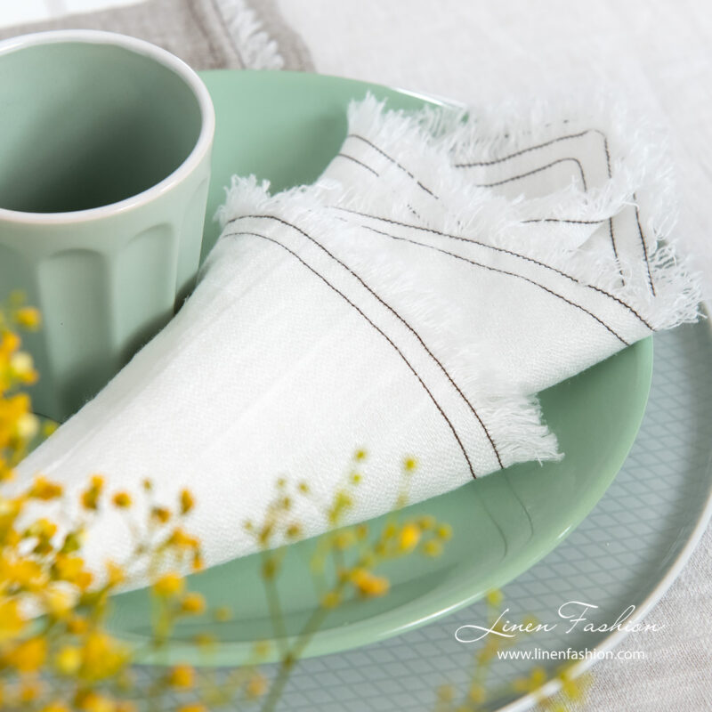 Linen washed white napkins with fringes