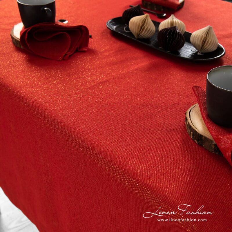 Linen tablecloth red with gold lurex yarns.