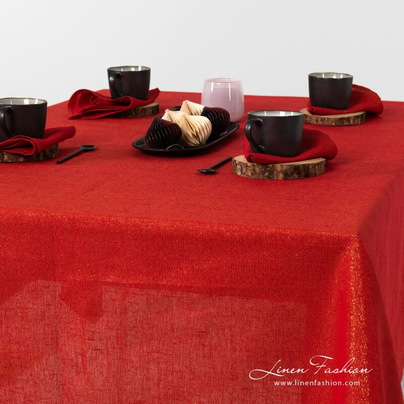 Linen tablecloth red with gold lurex yarns.