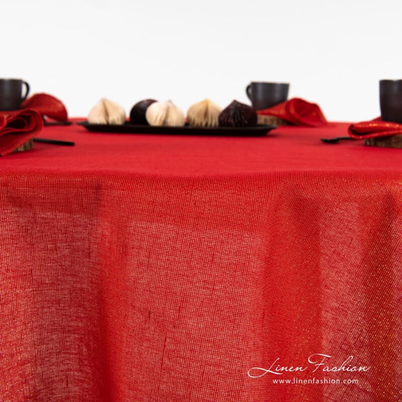Round red linen tablecloth Donna with piping around.