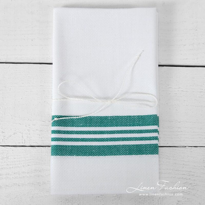 Bright white kitchen towel with green stripes