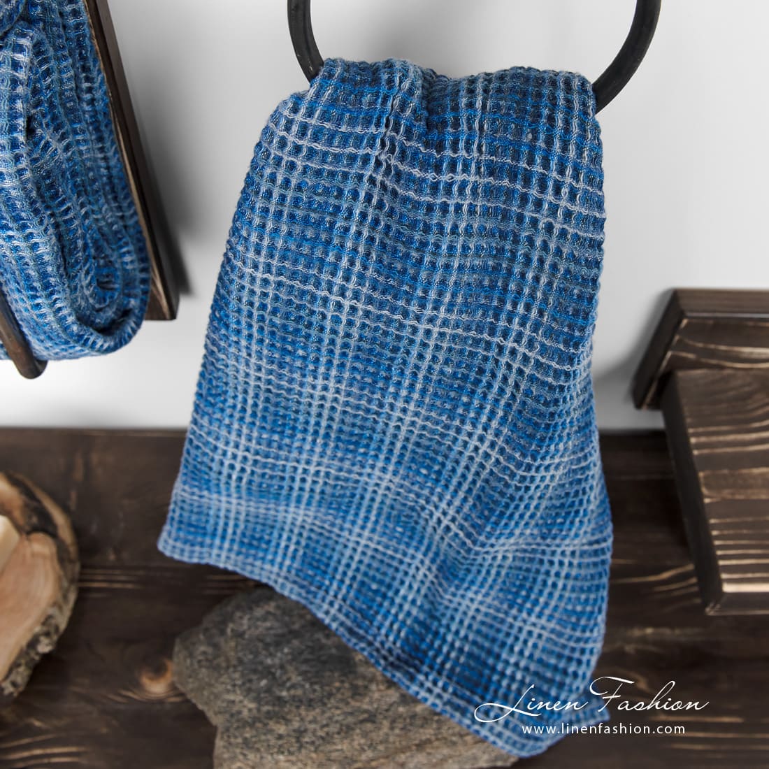 Blue linen cotton bath towel in waffle pattern