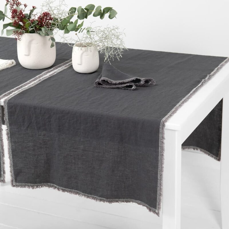 grey linen runner with decorative stitch, washed