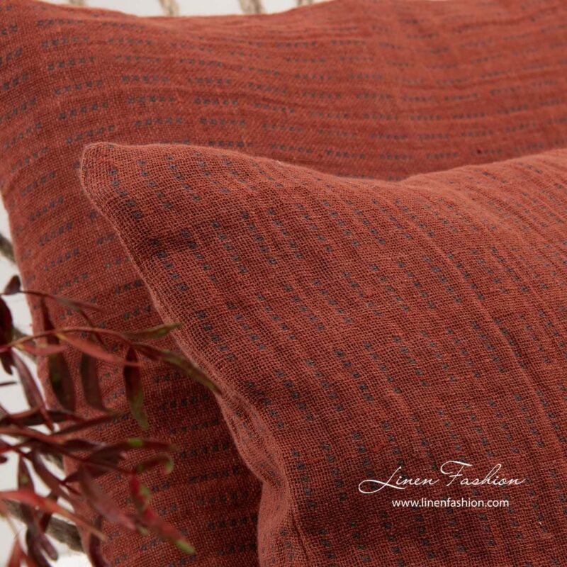 Cushion cover in red color, terra.