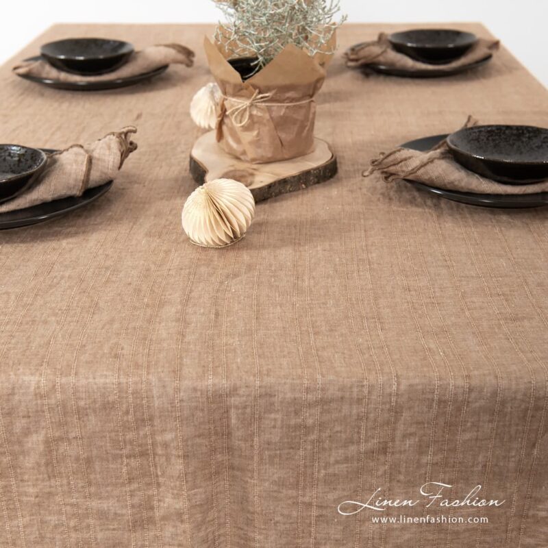 Brown tablecloth of 100% linen fabric.