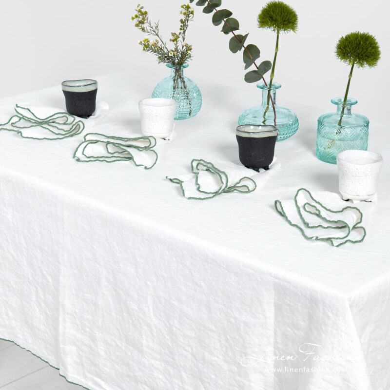 ARVO white linen tablecloth with green border