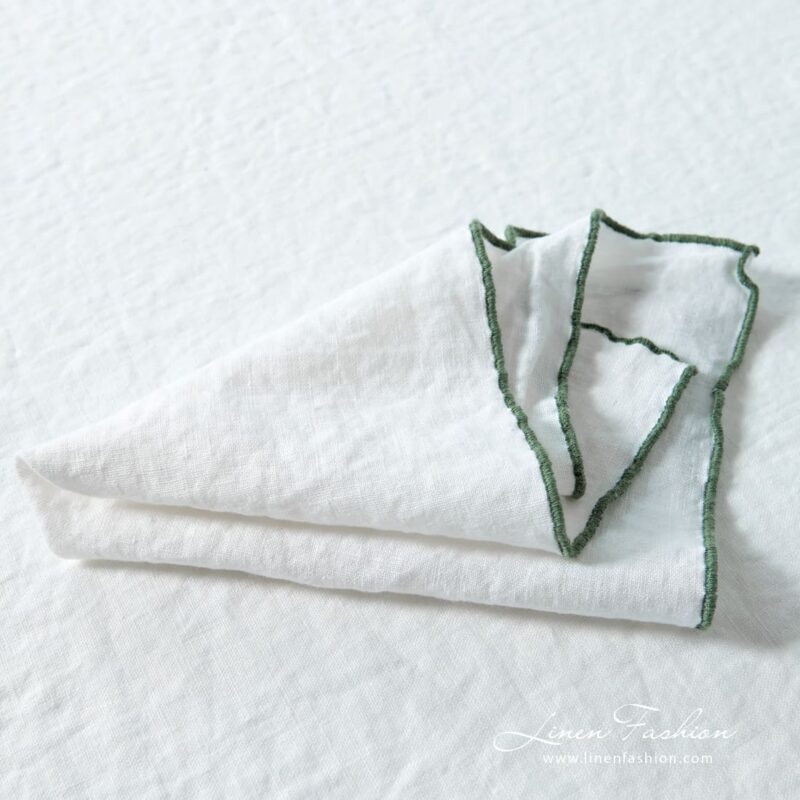 ARVO white linen napkin with green border