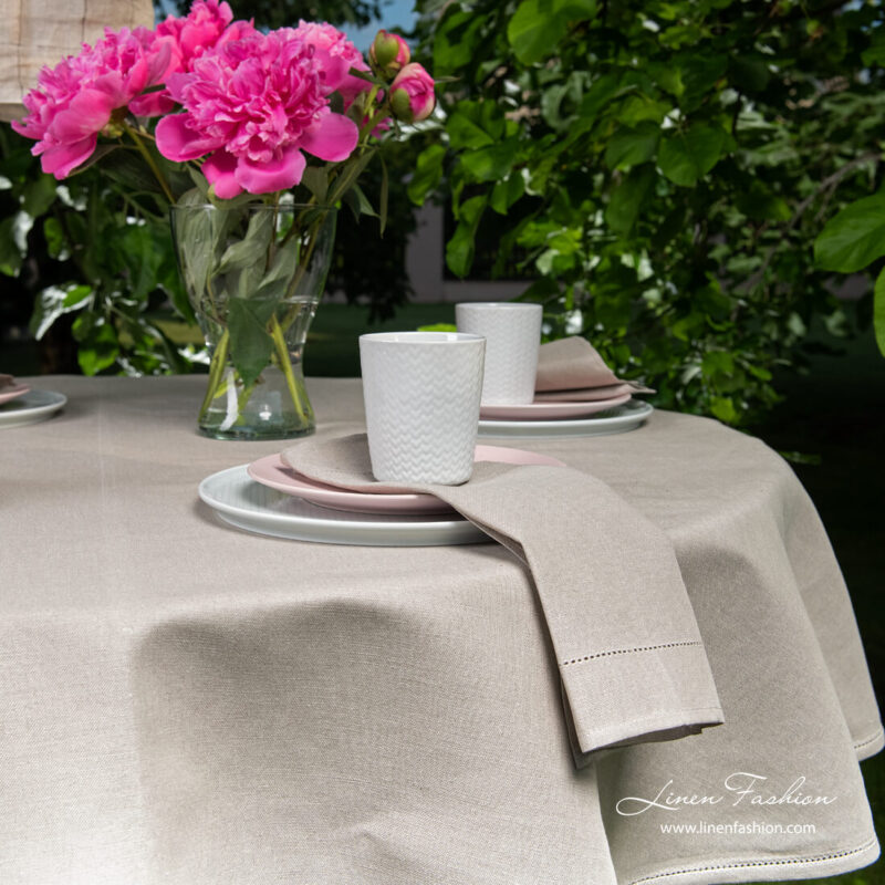 Close view of dark grey round (oval) linen tablecloth with hemstitch