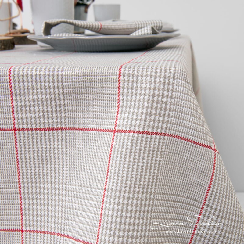 Large red squares on grey checked tablecloth