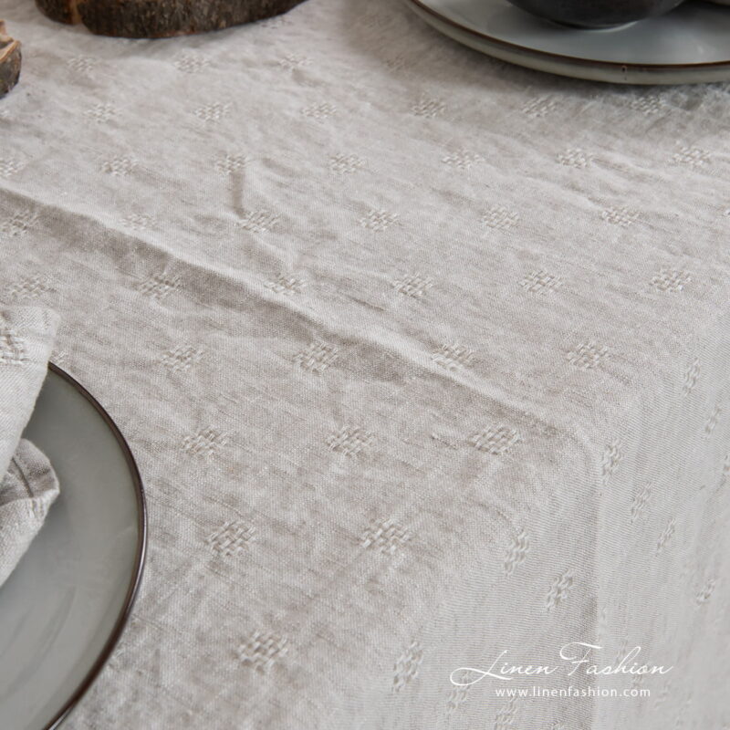 Solo grey colored tablecloth.