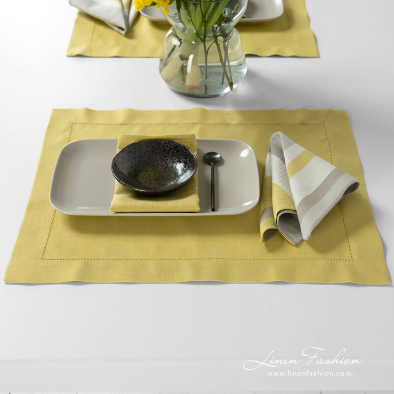 Linen cotton placemat in yellow with hemstitch.