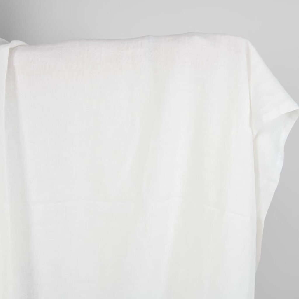Washed linen fabric in off-white