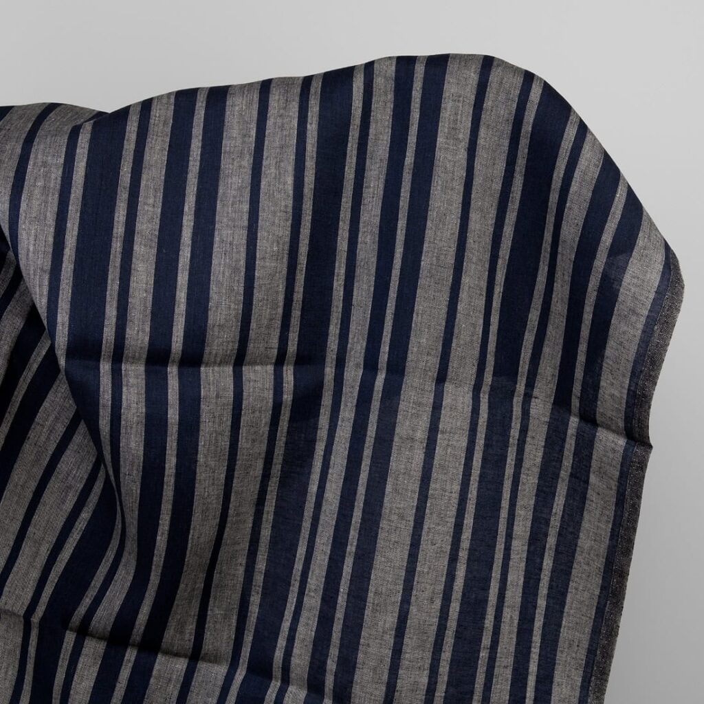 Linen fabric in blue and natural stripes