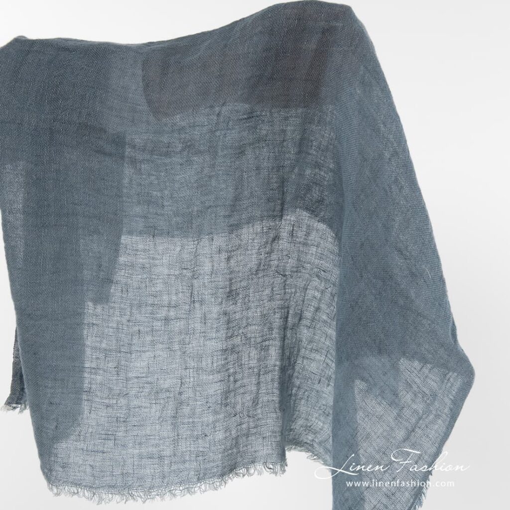 Gauze linen fabric in bluish grey color.
