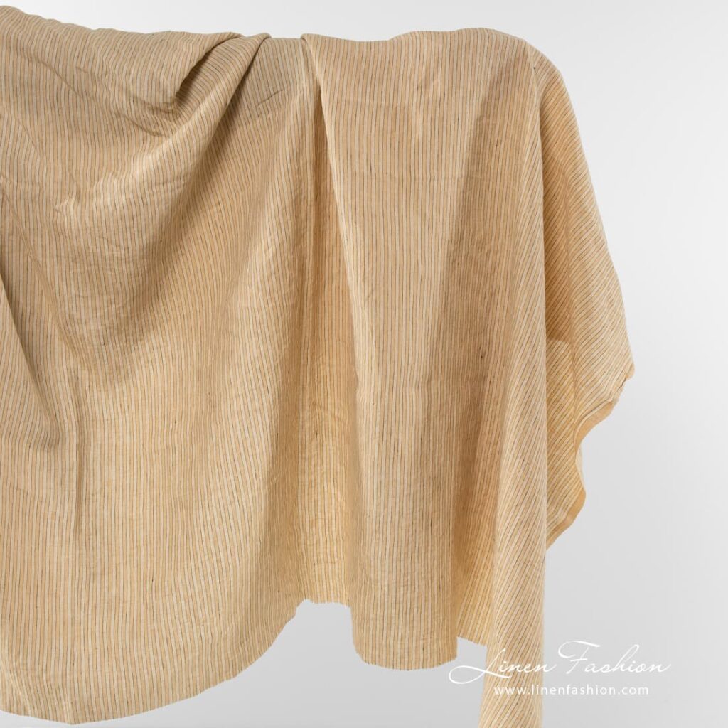 Linen fabric in pale yellow.