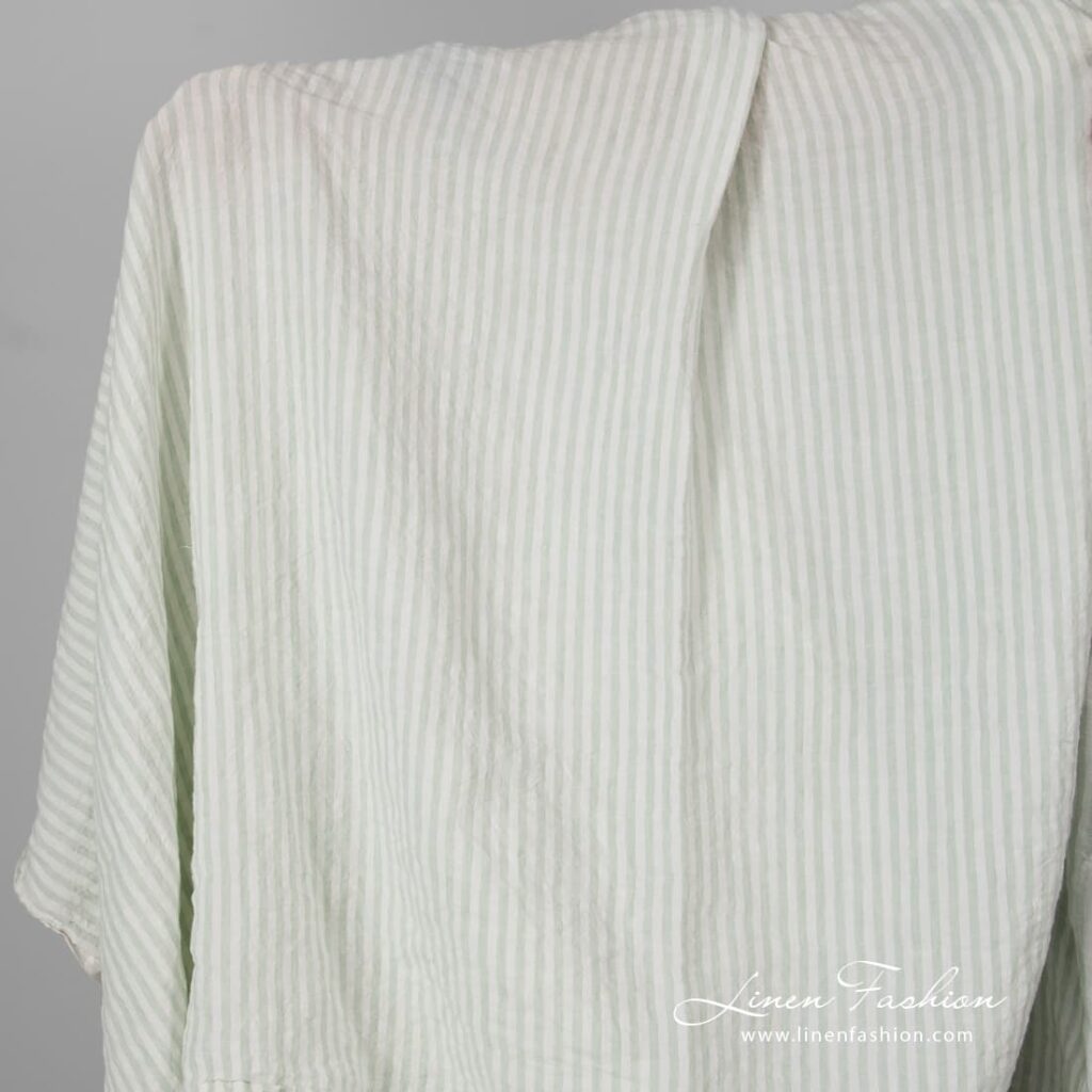 Wide linen fabric green stripes, washed.