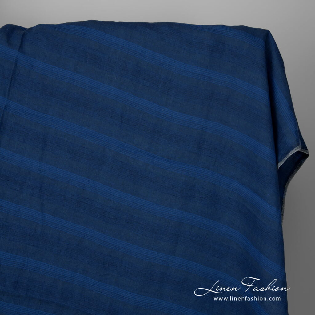 Wide washed linen fabric in blue stripes