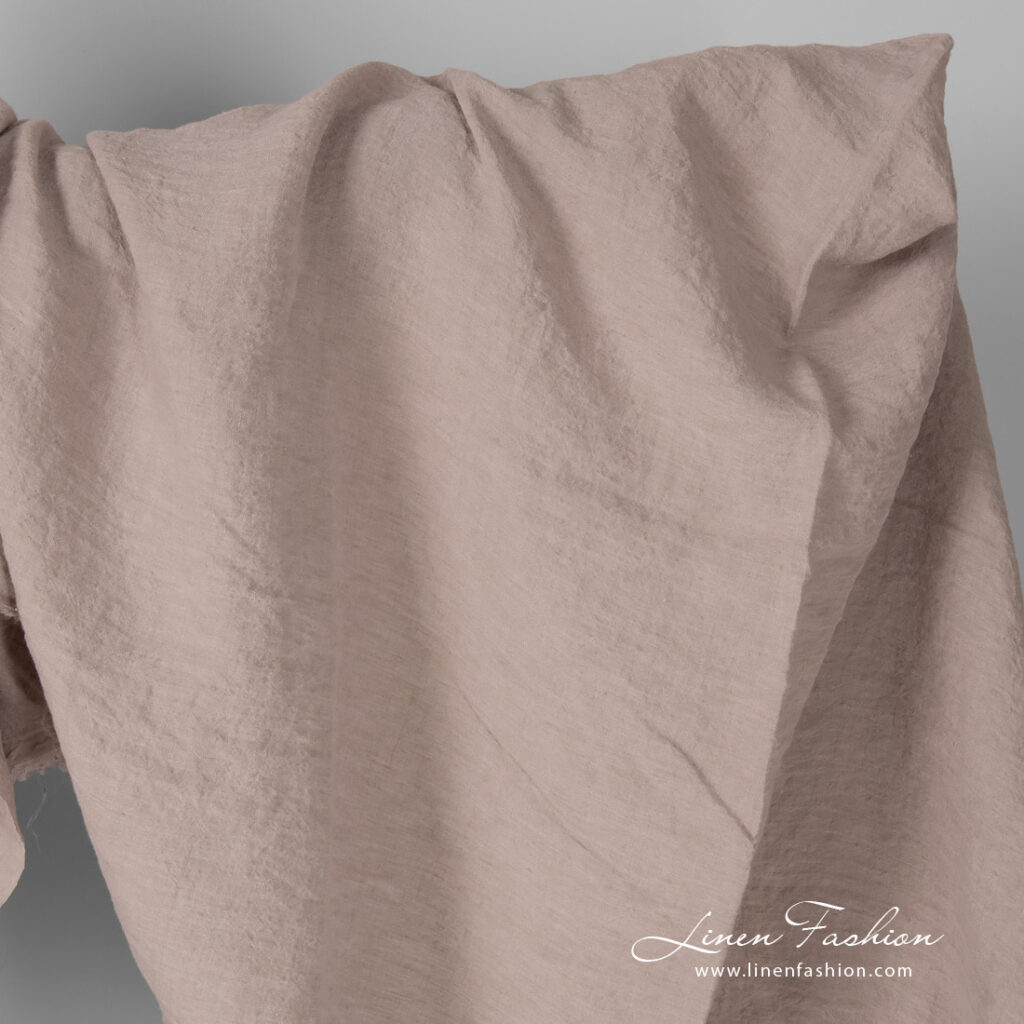Wide linen fabric in smokey rose colour, washed