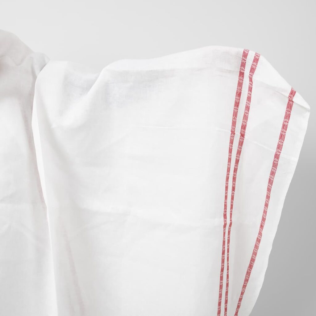 White linen fabric with red lines
