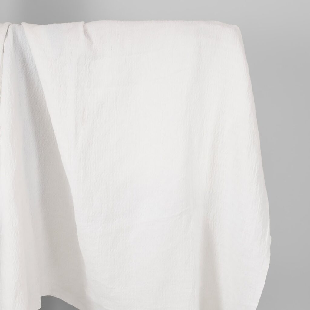 white linen cotton fabric zigzag, washed.