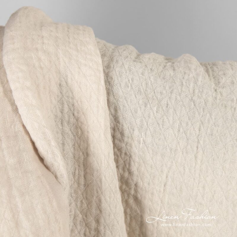 Light cream linen fabric in rhombus, washed