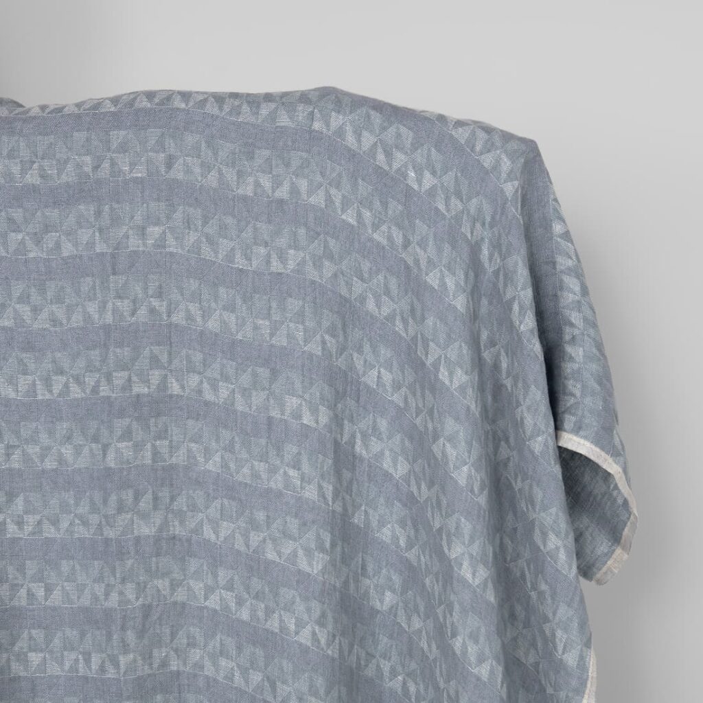 Washed linen fabric grey violet jacquard triangle pattern