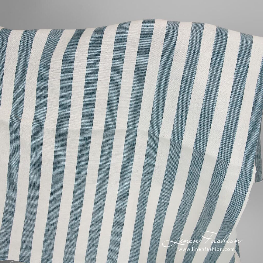 Thick linen fabric with white turquoise stripes.