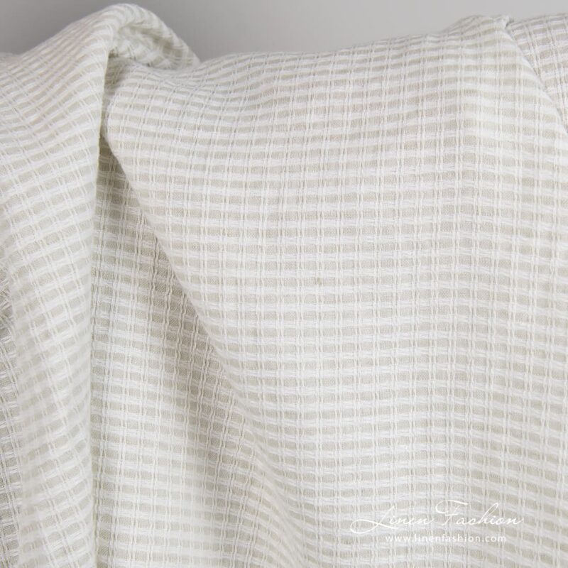Linen - cotton fabric in checks woven from optical white and light grey yarns