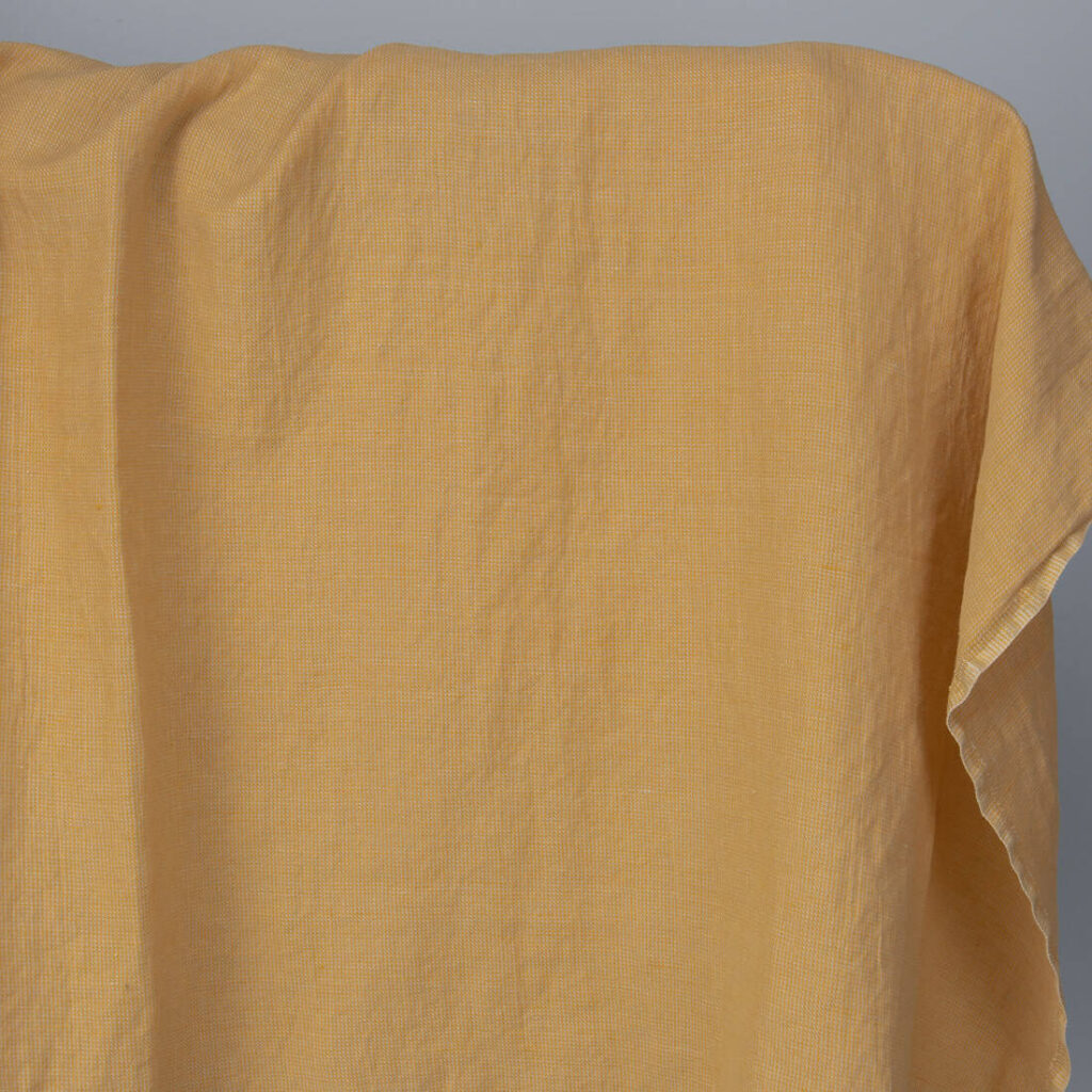 Washed linen cotton fabric in yellow-sand small pattern