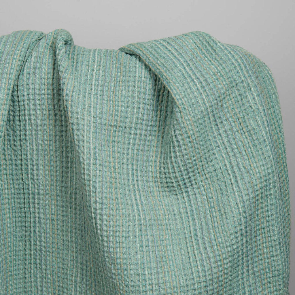 Washed green linen cotton waffle weave fabric