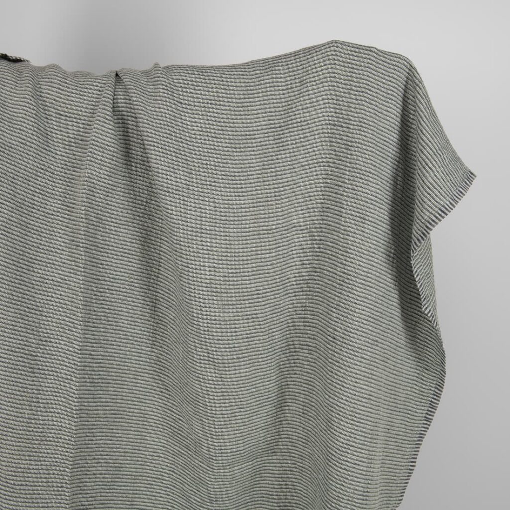 Washed linen fabric green-grey small pattern
