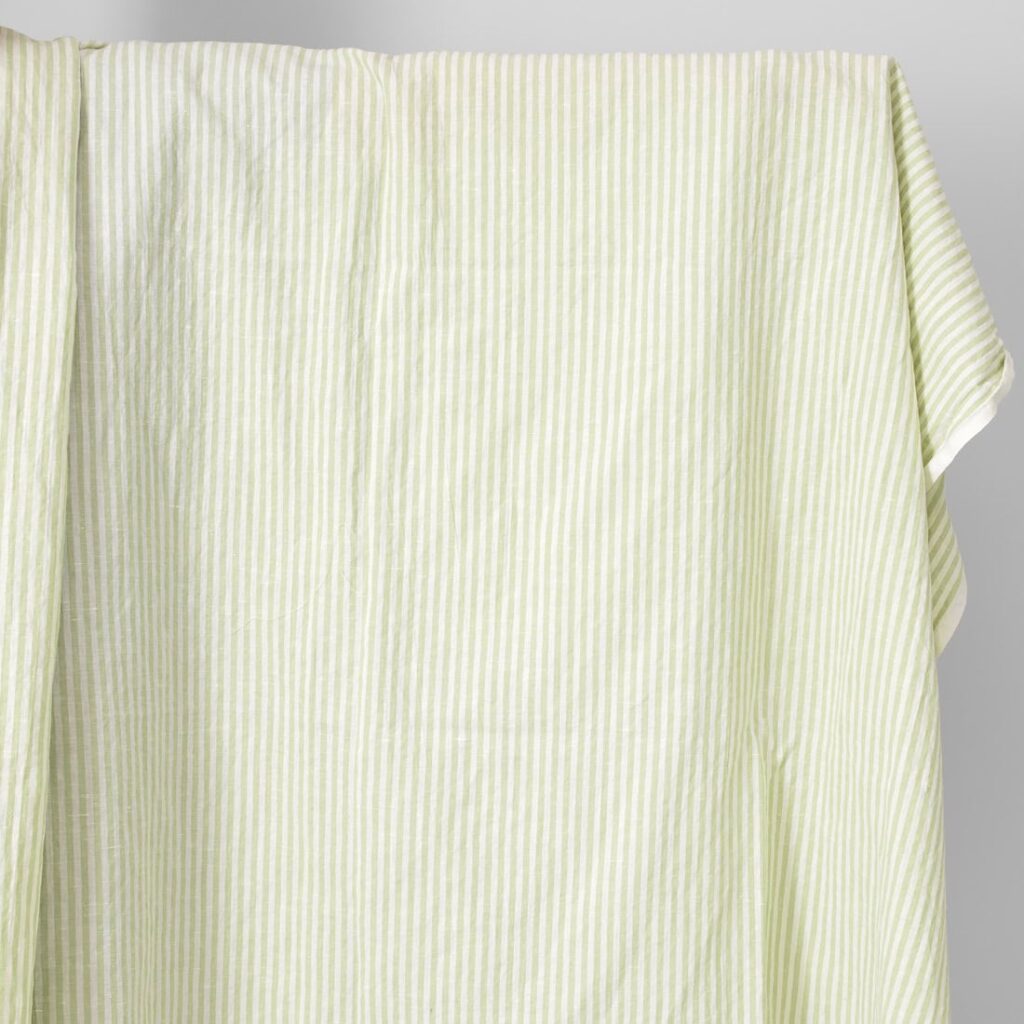 linen cotton light green striped fabric, washed.