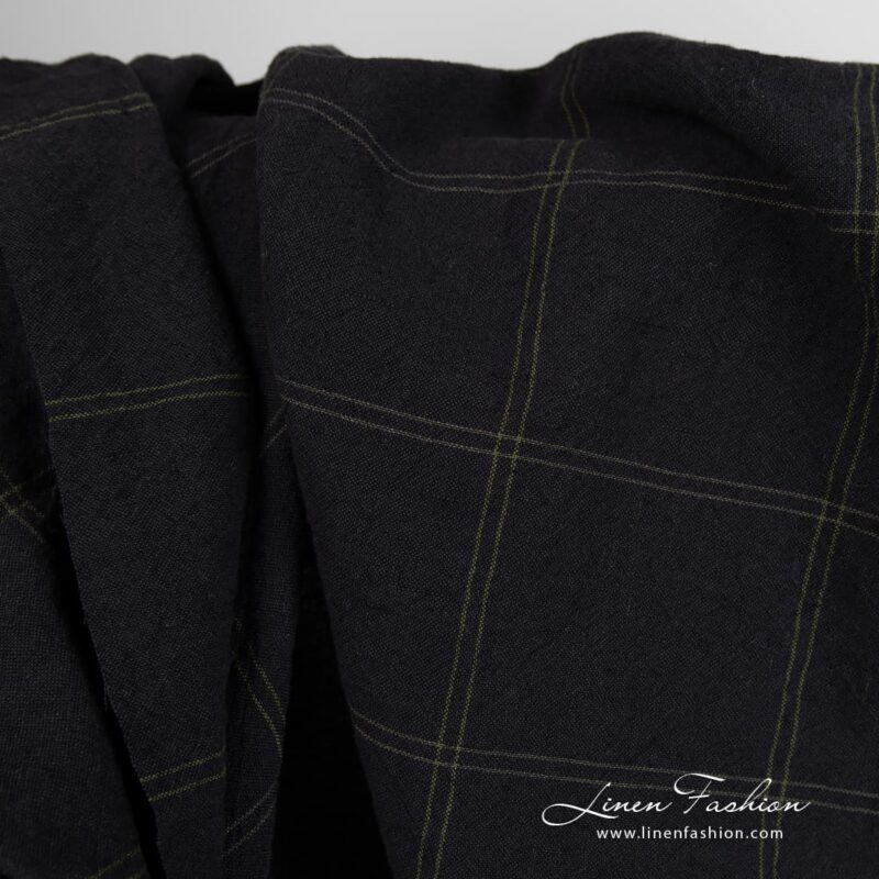 Wide black linen cotton fabric in green checks, specially washed to increase softness
