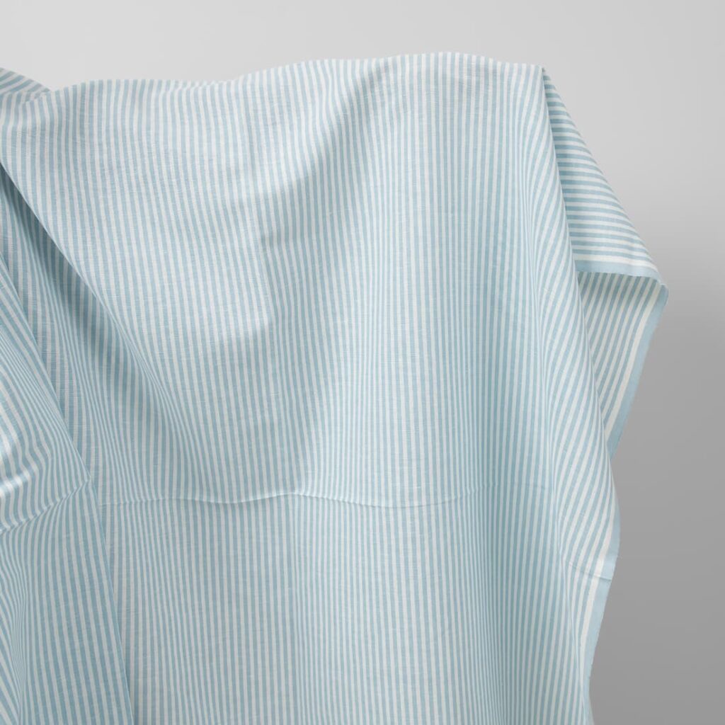 Wide linen cotton fabric in white and light turquoise stripes
