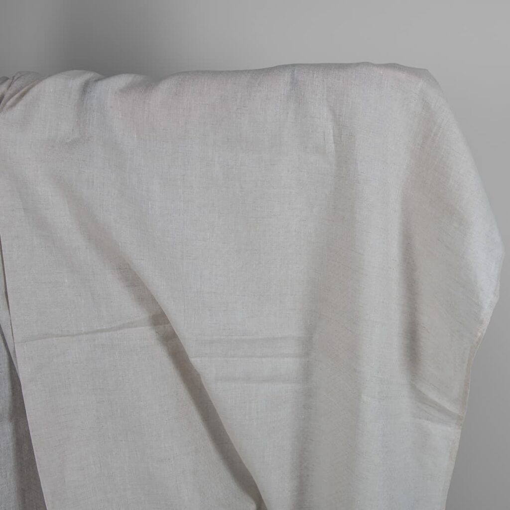 Patterned fabric undyed linen and white mix