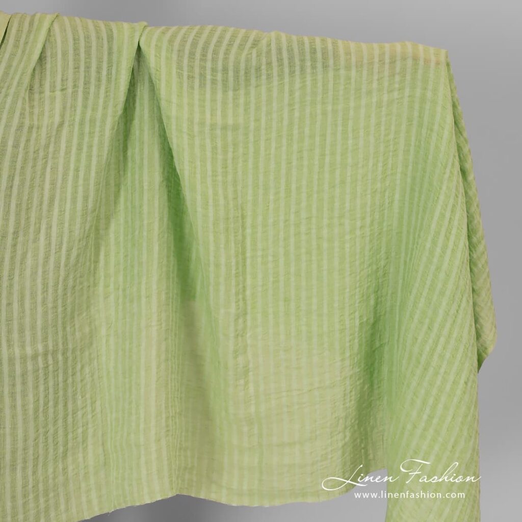 Linen fabric lime green stripes, washed.