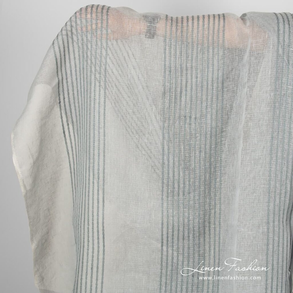 Grey gauze linen fabric with stripes.