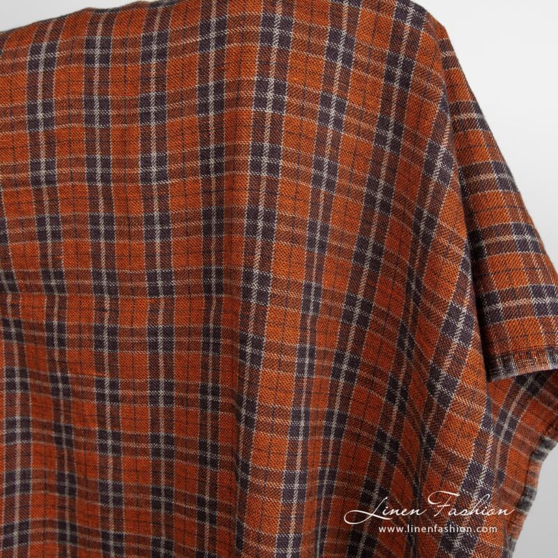 Orange linen wool fabric in checks, specially washed to increase softness
