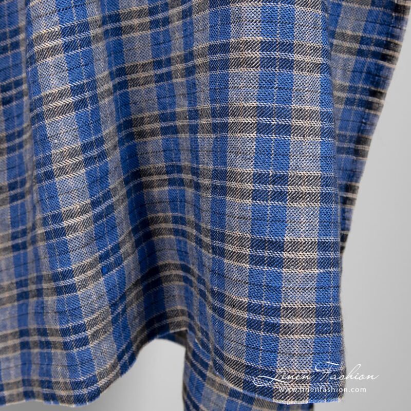 Blue linen wool fabric in checks, specially washed to increase softness